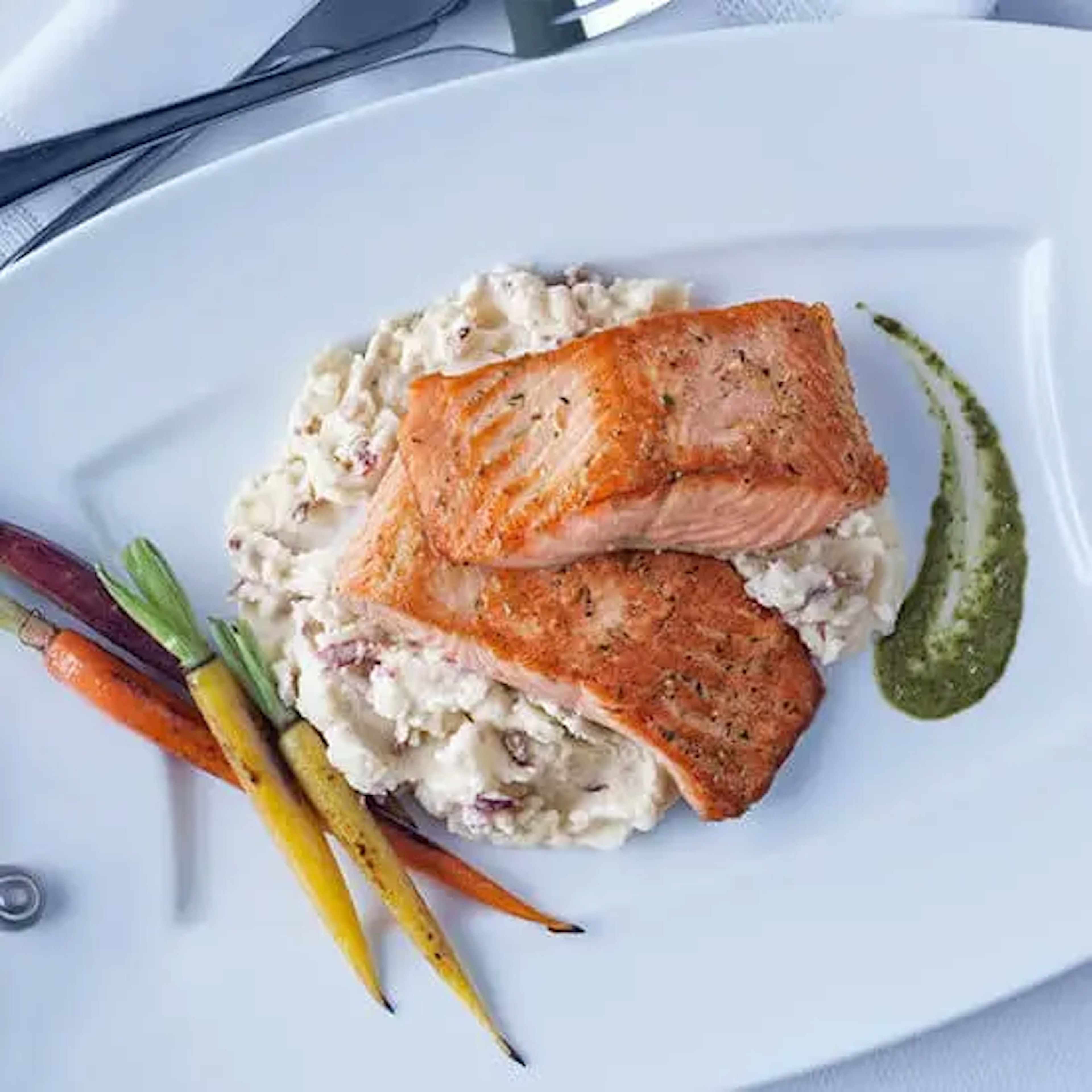 Roasted Salmon with Redskin Mashed Tri Colored Carrots Pesto